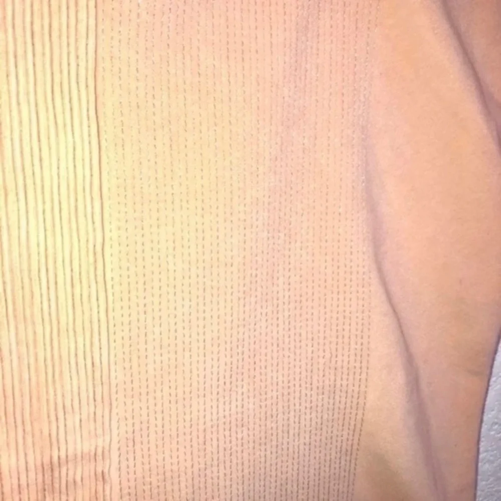 SOFT SQUARE PEACH PILLOW CASE WITH METALLIC SHIMMER DETAIL AND TINY RUFFLES